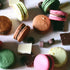 Handmade chocolate macaron selection with 18 indulgent flavours including praline, pistachio white chocolate and more