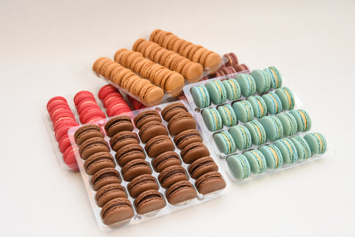chocolate, salted caramel and raspberry macaron trays