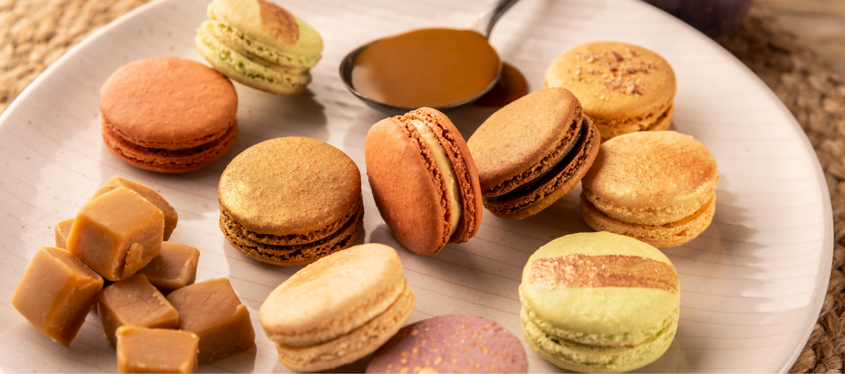 Autumn macaron gift box collection, pumpkin spice, toffee apple, chocolate caramel, vanilla tonka bean, fig and cream cheese.