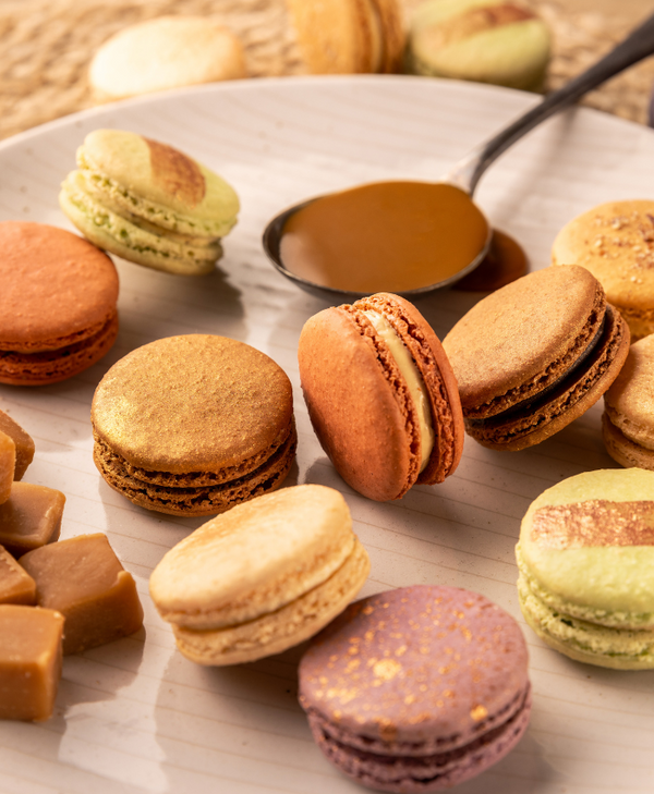 Autumn macaron gift box collection, pumpkin spice, toffee apple, chocolate caramel, vanilla tonka bean, fig and cream cheese.