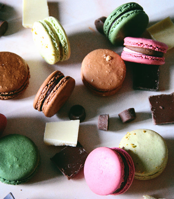 Handmade chocolate macaron selection with 18 indulgent flavours including praline, pistachio white chocolate and more