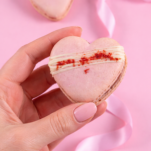 Love heart shaped French macaron close up 