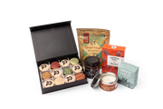 Large Branded Hot Chocolate Hamper - open branded macaron box with hot chocolate, chutney, shortbread, cheese sables and candle