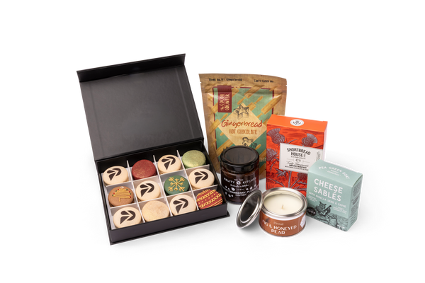 Large Branded Hot Chocolate Hamper - open branded macaron box with hot chocolate, chutney, shortbread, cheese sables and candle