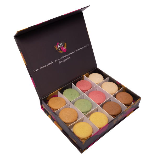 classic macaron gift box with 12 French macarons including pistachio, lemon, salted caramel and chocolate, ideal for gifting